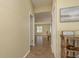 Hallway with wood floors leads to open living space at 4514 Dewey Dr, New Port Richey, FL 34652
