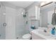 Bathroom featuring a glass shower, white vanity, and a white medicine cabinet at 4531 Swordfish Dr, Bradenton, FL 34208
