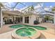 Backyard pool with hot tub, overlooking the residence and the surrounding neighborhood at 4531 Swordfish Dr, Bradenton, FL 34208