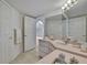 Bathroom featuring an arched doorway and open entrance to a living space at 10412 Ireland St, Spring Hill, FL 34608