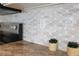 Close-up of kitchen backsplash with decorative tile and granite countertop details at 11594 Oak Ln, Largo, FL 33778