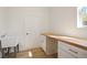 Bright laundry room featuring butcher block countertop and lots of room to do laundry at 11594 Oak Ln, Largo, FL 33778