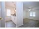Bathroom area flows to bedroom area with tile floors, shuttered windows, and modern fixtures at 609 Fort Duquesna Dr, Sun City Center, FL 33573