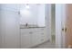 Charming bathroom features granite countertop, white cabinetry, and tile flooring at 609 Fort Duquesna Dr, Sun City Center, FL 33573