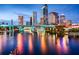 Beautiful night view of downtown Tampa, Florida skyline reflected in the water with bridges and palm trees at 609 Fort Duquesna Dr, Sun City Center, FL 33573