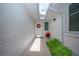 Inviting home entrance with a decorated front door and a covered walkway at 609 Fort Duquesna Dr, Sun City Center, FL 33573