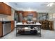 Modern kitchen featuring stainless steel appliances, updated cabinets, and functional island at 609 Fort Duquesna Dr, Sun City Center, FL 33573