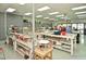 Bright studio offering multiple workstations, storage, and equipment for various crafts and creative activities at 609 Fort Duquesna Dr, Sun City Center, FL 33573