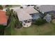 Aerial view showcasing the home's backyard, pool, and outdoor space at 10626 Restoration Ter, Bradenton, FL 34212