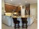 Well-equipped kitchen with granite countertops, stainless steel appliances, and ample cabinet space at 10626 Restoration Ter, Bradenton, FL 34212