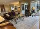Spacious living room with large windows and sliding doors provide plenty of natural light at 10626 Restoration Ter, Bradenton, FL 34212