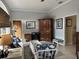Comfortable living room with rattan furniture and elegant decor, creating a relaxing atmosphere at 10626 Restoration Ter, Bradenton, FL 34212