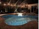Sparkling pool and spa with patio furniture for outdoor entertaining at 10626 Restoration Ter, Bradenton, FL 34212