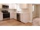 Well-appointed kitchen with stainless steel appliances and bright white cabinetry at 7160 Lenape Cir, New Port Richey, FL 34653