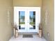 Beautiful Double front doors with sidelights and stylish door hardware provide curb appeal to home at 8610 Quinn Ct, North Port, FL 34287