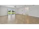Open-concept living room featuring access to the lake at 12811 Wanderlust Pl, Parrish, FL 34219