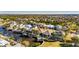 Aerial view of beautiful waterfront community with boat docks and lush tropical landscaping at 5606 Seagrass Pl, Apollo Beach, FL 33572