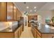 Spacious kitchen with granite countertops, stainless steel appliances, and ample cabinet space at 5606 Seagrass Pl, Apollo Beach, FL 33572