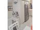 Charming kitchen with stainless steel fridge and decorative accents at 5901 Bahia Del Mar Cir # 321, St Petersburg, FL 33715