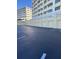 View of the condo association garages and parking areas at 100 Bluff View Dr # 205C, Belleair Bluffs, FL 33770