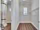 This closet features hardwood floors, a window and wire rack shelving at 1308 Alhambra Dr, Apollo Beach, FL 33572