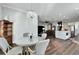 Cozy dining area adjacent to the kitchen, featuring hardwood floors and ample space for Gathering gatherings at 1308 Alhambra Dr, Apollo Beach, FL 33572