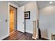 Hallway featuring an open elevator and hardwood floors at 1308 Alhambra Dr, Apollo Beach, FL 33572