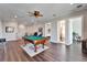 Game room featuring a pool table with views into the bedroom and bathroom at 1308 Alhambra Dr, Apollo Beach, FL 33572