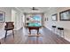 Spacious game room with a pool table, ceiling fan, and access to the balcony at 1308 Alhambra Dr, Apollo Beach, FL 33572