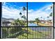 View of the lake from the screened-in patio at 1308 Alhambra Dr, Apollo Beach, FL 33572