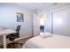 Clean bedroom featuring a dedicated desk space and natural light at 1926 Burlington N Ave, St Petersburg, FL 33713