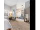 Cozy bedroom with neutral tones, carpeted flooring, and a view of the entry way at 1926 Burlington N Ave, St Petersburg, FL 33713
