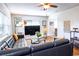 Comfortable living room featuring a large leather sectional, modern decor, and plenty of natural light at 1926 Burlington N Ave, St Petersburg, FL 33713