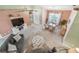 Bright living room with comfortable seating, modern entertainment center and stylish decor at 326 Caloosa Woods Ln, Sun City Center, FL 33573