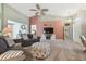 Bright living room with comfortable seating, high ceilings, and stylish decor at 326 Caloosa Woods Ln, Sun City Center, FL 33573