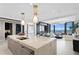 Kitchen with island offering modern pendant lights and luxury countertops at 301 1St S St # 1002, St Petersburg, FL 33701