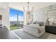 Luxurious main bedroom with a stunning view and elegant decor creating a serene retreat at 301 1St S St # 1002, St Petersburg, FL 33701