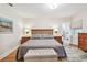 Cozy bedroom with hardwood floors and neutral decor at 487 9Th N Ave, St Petersburg, FL 33701