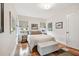 Bedroom featuring hardwood floors, natural light, and neutral decor at 487 9Th N Ave, St Petersburg, FL 33701