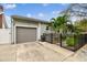Home's exterior featuring a driveway and a well-manicured lawn at 487 9Th N Ave, St Petersburg, FL 33701