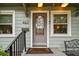 Charming front door with decorative glass and a covered porch at 487 9Th N Ave, St Petersburg, FL 33701