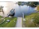 Aerial shot of a boat ramp and pier, perfect for lake access and water activities at 2972 Lake Saxon Dr, Land O Lakes, FL 34639