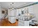 Bright kitchen with an island, sleek countertops, and a convenient layout at 11710 N Armenia Ave, Tampa, FL 33612
