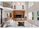 Spacious living room featuring a custom entertainment center and elegant decor at 11710 N Armenia Ave, Tampa, FL 33612