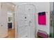 Bathroom featuring a standalone shower, storage, and modern fixtures at 5719 23Rd S Ave, Gulfport, FL 33707