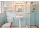 Bathroom featuring blue and pink tile at 51 Lexington Dr, Dunedin, FL 34698