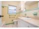 Bathroom featuring tile flooring and a large vanity at 51 Lexington Dr, Dunedin, FL 34698