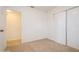 Bedroom with carpeting and a closet at 51 Lexington Dr, Dunedin, FL 34698