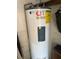 Efficient Rheem water heater with energy guide for cost-effective operation and reliable hot water supply at 51 Lexington Dr, Dunedin, FL 34698
