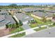 Residential home boasts beautiful landscaping, a paved driveway, and a fenced backyard at 6232 Sea Air Dr, Apollo Beach, FL 33572